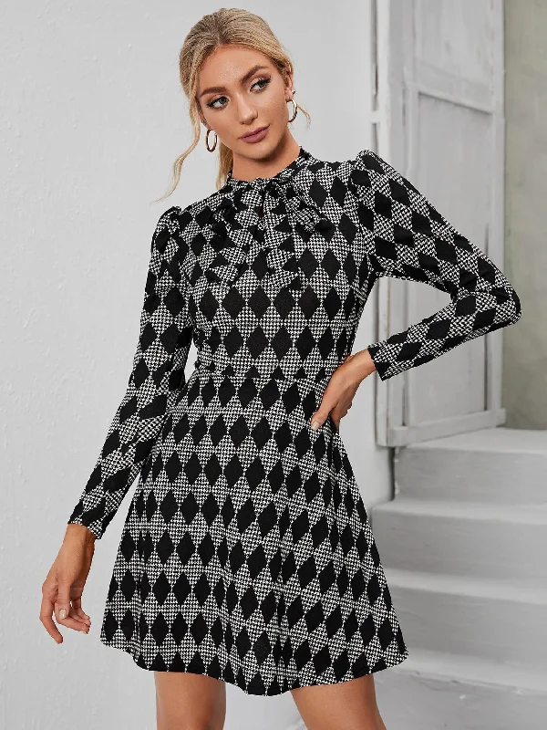 Midi dresses with V - necklines for a flattering and elongating effect KittenAlarm - Houndstooth Print Puff Sleeve Flare Dress