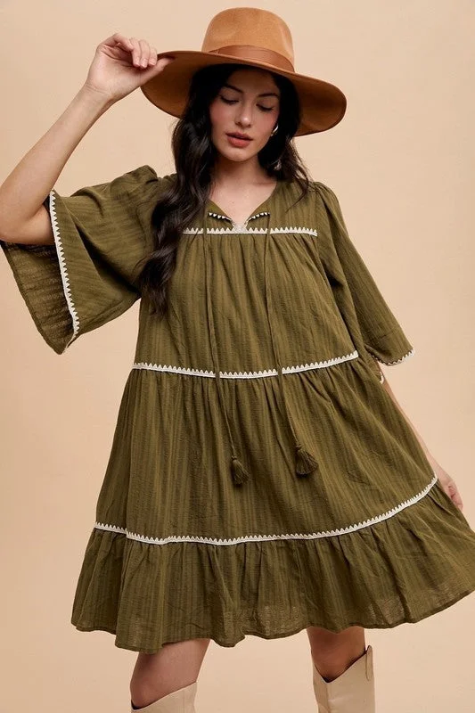 Mini dresses with beaded embellishments for a fancy event Annie Wear Tassel Contrast Trim Tie Neck Half Sleeve Tiered Dress Mini dresses with beaded embellishments for a fancy event Annie Wear Tassel Contrast Trim Tie Neck Half Sleeve Tiered Dress