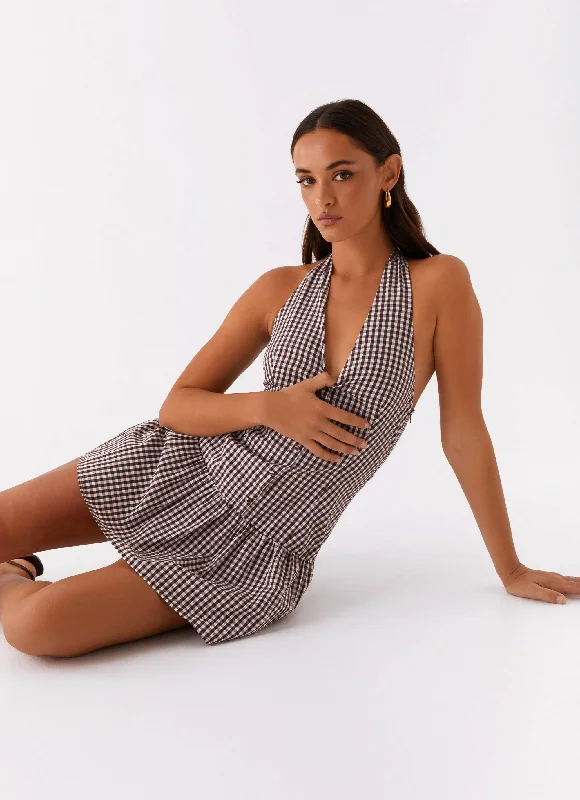Mini dresses with asymmetric hems for a fashion - forward look New Look Shirred Halter Mini Dress - Chocolate Gingham Mini dresses with asymmetric hems for a fashion - forward look New Look Shirred Halter Mini Dress - Chocolate Gingham