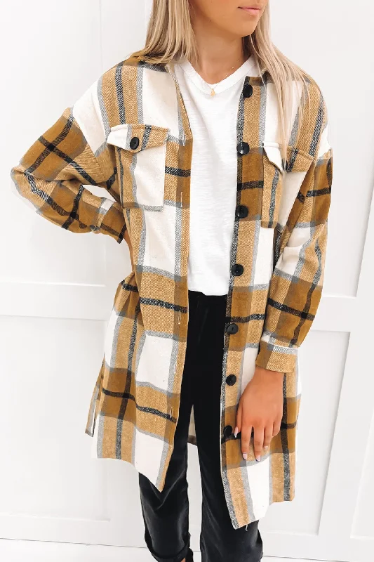 Women's cropped down jackets in bold colors for a sporty and fashionable winter outfitJude Shacket Brown