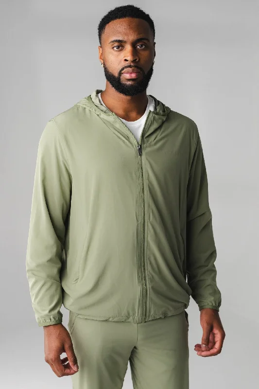Women's zip - up sweatshirt in pastel blue for a soft and stylish outfitVitality Prime® Windbreaker - Matcha Women's zip - up sweatshirt in pastel blue for a soft and stylish outfitVitality Prime® Windbreaker - Matcha