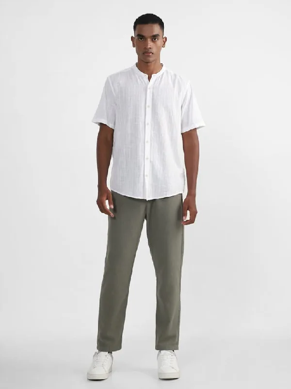 Ruffled Hem Women Shorts to Add a Feminine TouchETA Solid Sage-Colored Cotton Slim-Fit Mid-Rise Chinos Ruffled Hem Women Shorts to Add a Feminine TouchETA Solid Sage-Colored Cotton Slim-Fit Mid-Rise Chinos